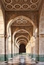 Beautiful Islamic architecture with intricate ceiling design and arches.